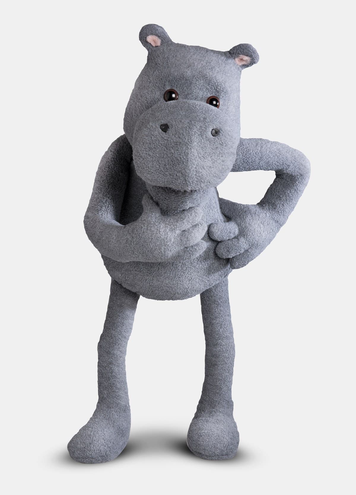 The Hippo.co.za mascot, a grey plush hippo standing with its arms folded